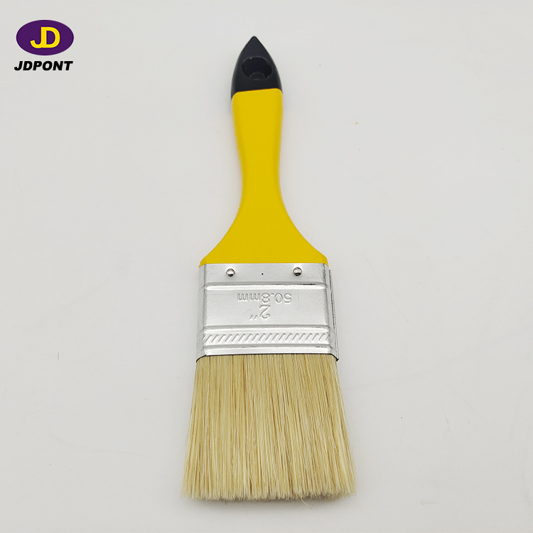 Yellow wooden handle bristle filament paintbrush for most of the paint